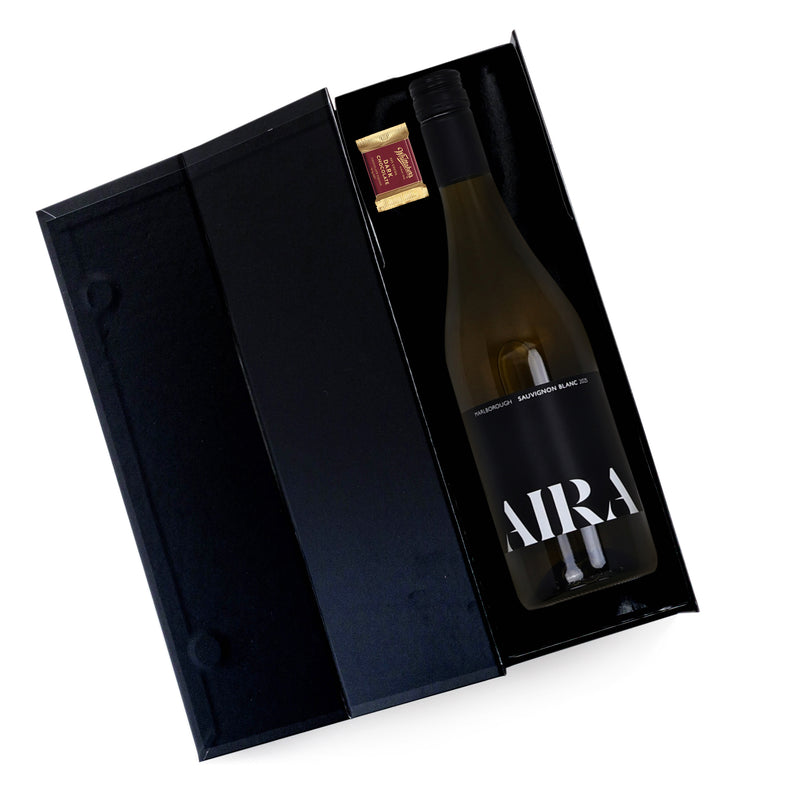 Wine bottle in a black gift box with &